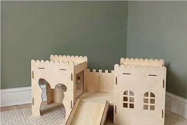 Wooden castle-style house for rabbits